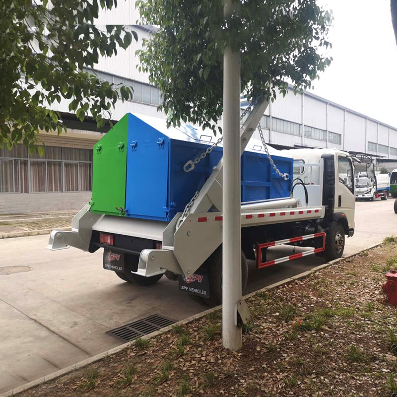 Howo 4 cubic meter swing arm garbage truck for sale